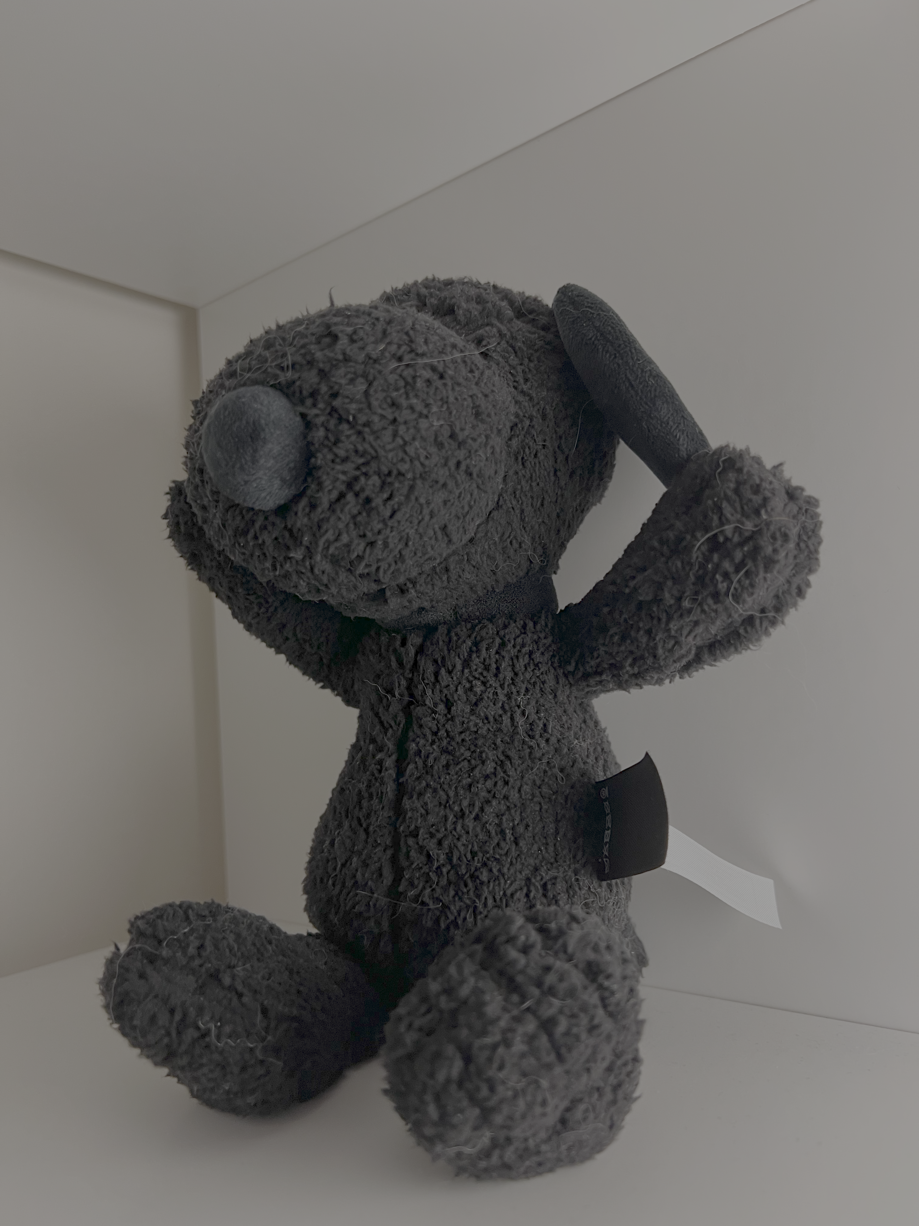 Selected to capture how the figure’s feet enlarge toward the base when viewed from below. This angle highlights the stance and balance of the body.